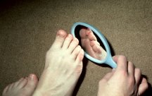 Hand mirror for looking at feet